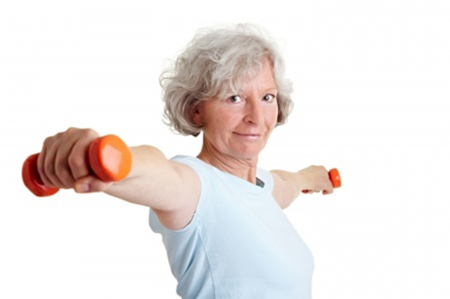 older lady with weights